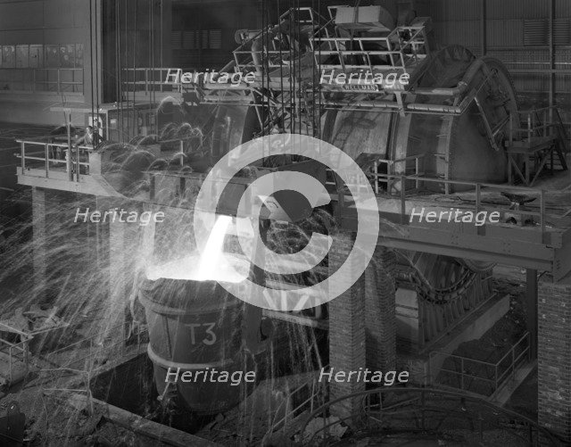 Pouring molten iron, Park Gate steelworks, Rotherham, South Yorkshire, 1964. Artist: Michael Walters
