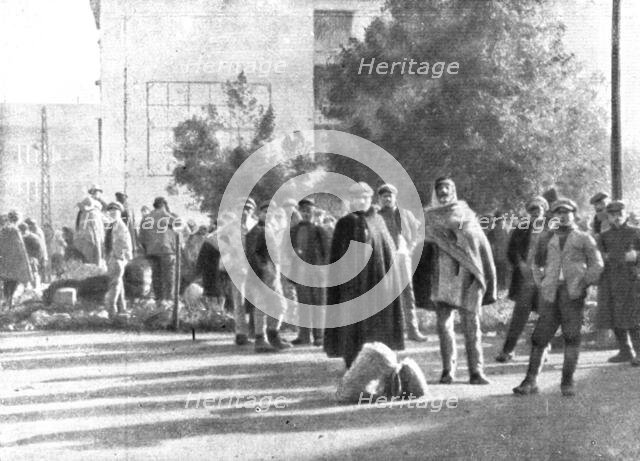 The Dark Hours of Italy; Refugees from Friuli in a square in Brescia, 1917. Creator: Unknown.