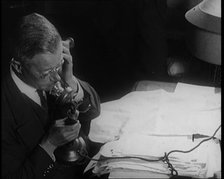 Journalist at Work on a Telephone, 1921. Creator: British Pathe Ltd.