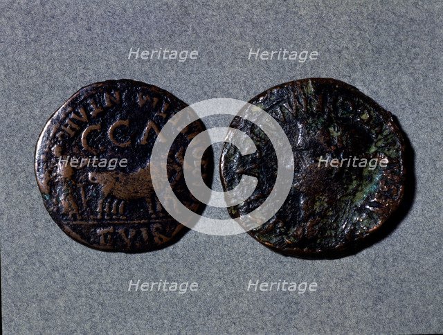 At left a coin with the legend 'Scipione er Montano II vir CCA', at right the front with the word…