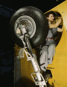 This woman worker at the Vultee-Nashville is shown making..., Nashville, Tenn. , 1943. Creator: Alfred T Palmer.