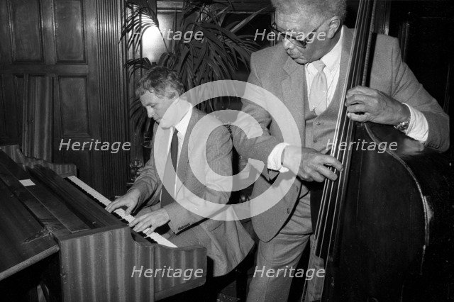 Brian Dee, Red Callender, Kettner's, London, November 1985.   Artist: Brian O'Connor.