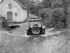 Kitty Brunell fording the River Exe in a Talbot 14/45 sportsman's coupe, Winsfors, Somerset, c1930s. Artist: Bill Brunell.