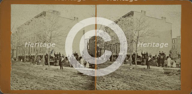 These 4 houses were moved 175 feet, without any injury to them whatever, c1850-1930. Creator: Unknown.