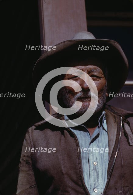 Man, possibly a farmer or agricultural laborer, between 1941 and 1942. Creator: Unknown.