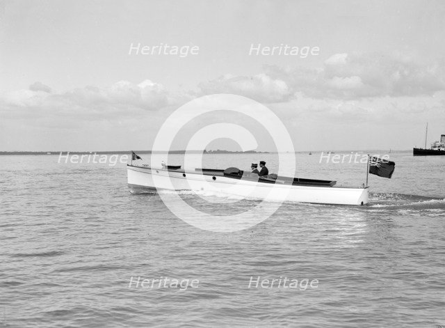 The motor launch 'Wendy' under way, 1913. Creator: Kirk & Sons of Cowes.