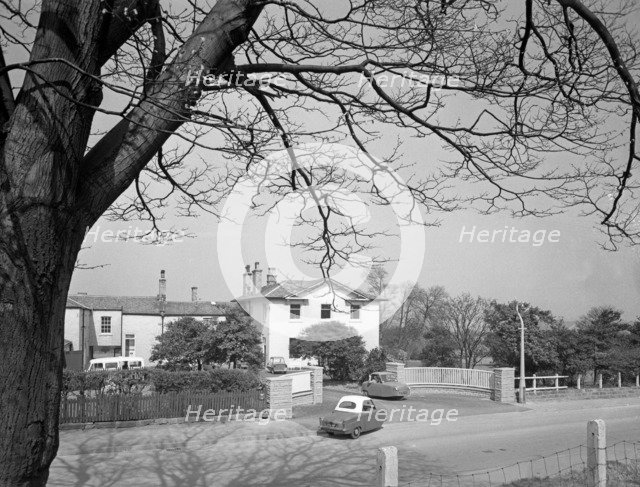 Two Bond disabled cars outside the CISWO paraplegic centre, Pontefract, West Yorkshire, 1960. Artist: Michael Walters