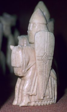 A Knight - The Lewis Chessmen, (Norwegian?), c1150-c1200. Artist: Unknown