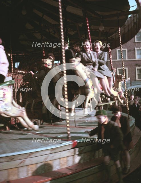 Carousel at a fair, c1955-1965. Creator: Arthur Charles Kirby Ware.