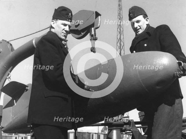 Two sailors with a torpedo, Sweden, 1955. Artist: Unknown