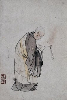 A Chinese man lighting a pipe, (between 1800 and 1899?). Creator: Unknown.