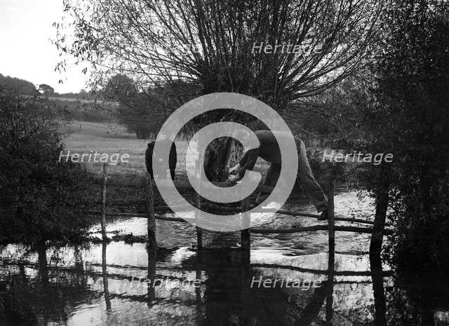Man taking part in the Bugatti Owners Club car treasure hunt, 25 October 1931. Artist: Bill Brunell.