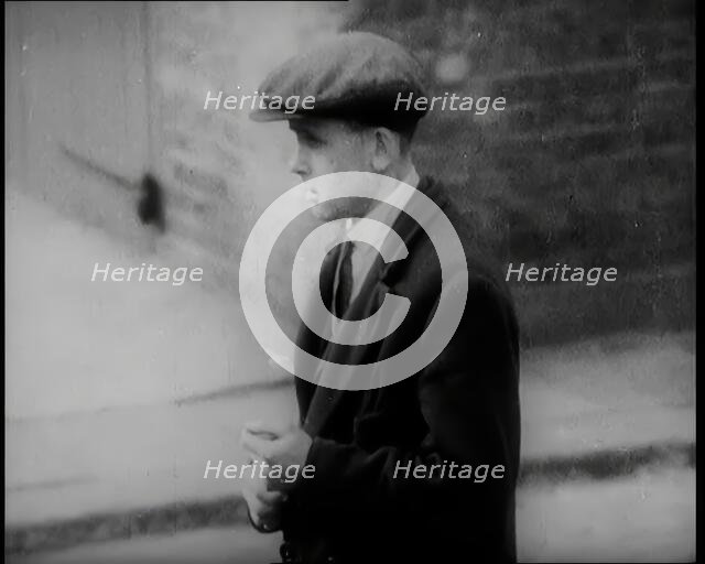 Male Civilians Standing in the Streets, 1926. Creator: British Pathe Ltd.