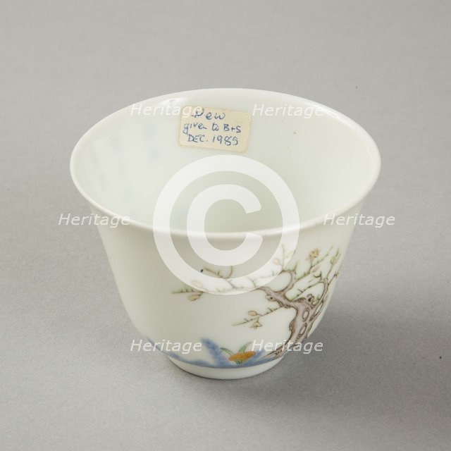 Underglaze blue month cup with polychrome enamelled decoration of a prunus tree. Artist: Unknown.