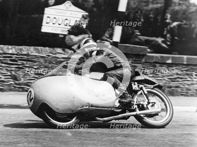 Bill Lomas at Governor's Bridge, Isle of Man Junior TT, 1955. Artist: Unknown