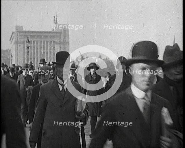Pedestrians And Commuters Crossing London Bridge, 1920s. Creator: British Pathe Ltd.