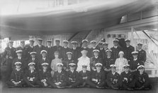King George V, Queen Mary and crew on board 'HMY Victoria and Albert', 1927. Creator: Kirk & Sons of Cowes.