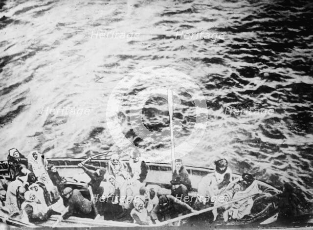 Titanic survivors on way to rescue-ship Carpathia, 1912. Creator: Bain News Service.