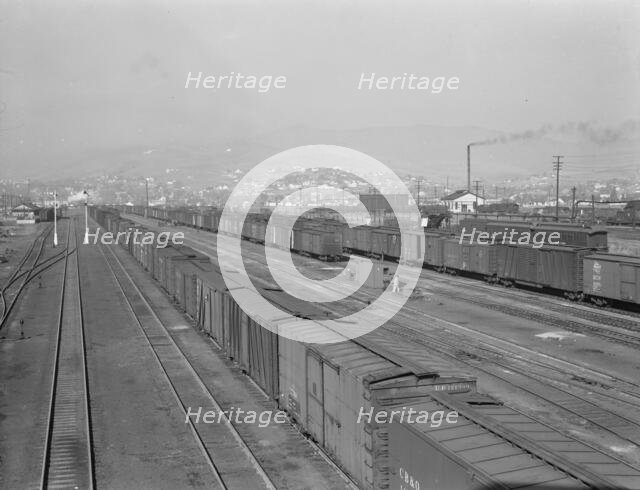 Railroad yard, outskirts of fast-growing town, Klamath Falls, Oregon, 1939. Creator: Dorothea Lange.