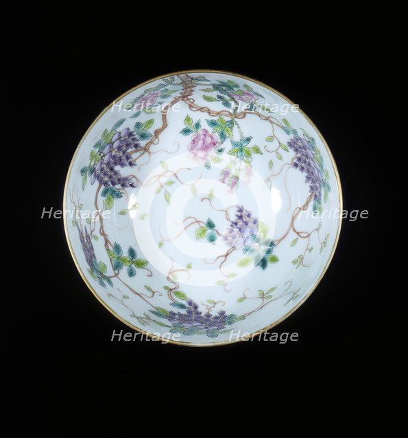 Bowl with ribboned swastikas above waves, Guangxu period, Qing dynasty, China, c1900. Artist: Unknown