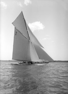 The 15 Metre cutter 'Sophie Elizabeth' sailing close-hauled, 1911.  Creator: Kirk & Sons of Cowes.