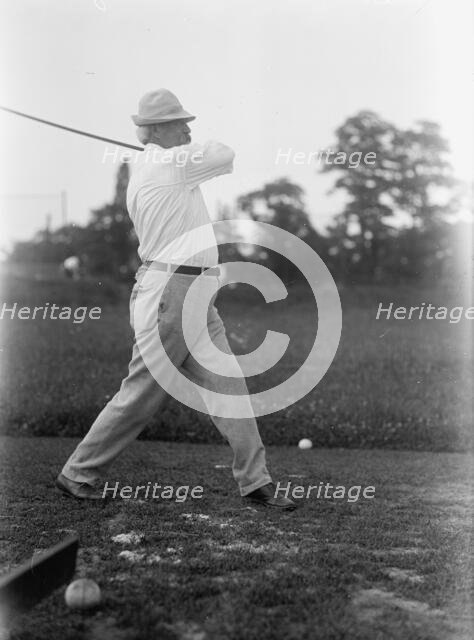 Cummins, Albert Baird, Governor of Iowa, 1902-1908; Senator, 1908-1926. Playing Golf, 1917. Creator: Harris & Ewing.