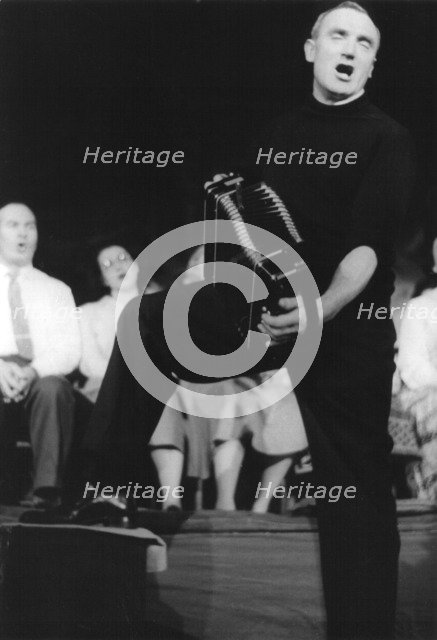 Bob Roberts playing the melodion, London, February 1961. Artist: Eddis Thomas