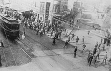 Rioters stoning a trolley car, Philadelphia, 1910. Creator: Bain News Service.