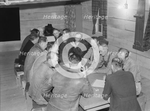 Meeting of the camp council, FSA camp, Farmersville, California, 1939. Creator: Dorothea Lange.