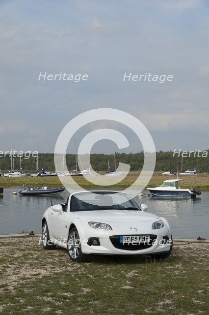 2014 Mazda MX5 Roadster Coupe Artist: Unknown.