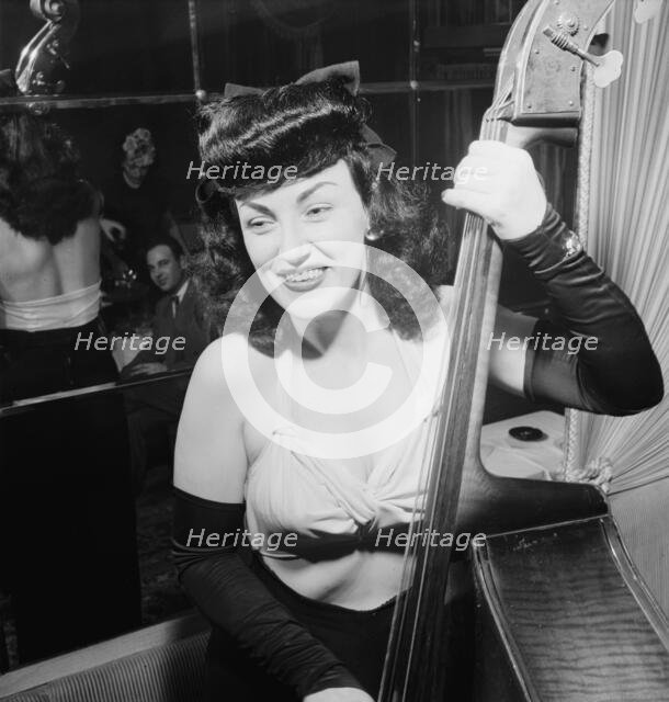 Portrait of Vivien Garry, New York, N.Y., Dixon's, ca. May 1947. Creator: William Paul Gottlieb.