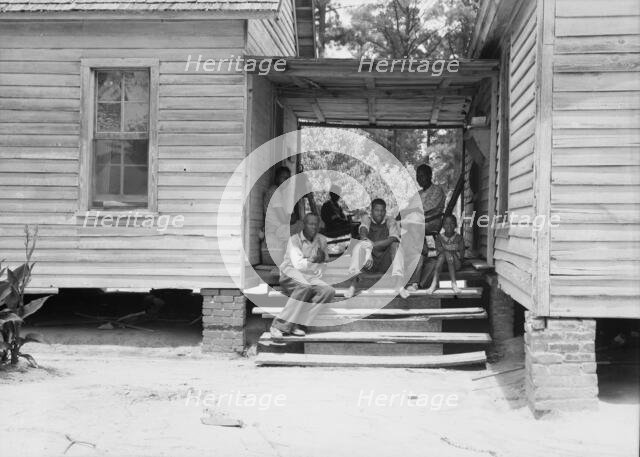 Zollie Lyons, Negro sharecropper, home from the field..., Upchurch, North Carolina, 1939. Creator: Dorothea Lange.