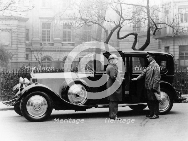 Rolls Royce with chauffeur. Artist: Unknown