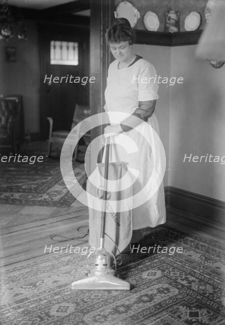 Dunlap vacuuming, between c1915 and c1920. Creator: Bain News Service.