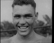 Jack Dempsey Grimacing for the Camera, 1921. Creator: British Pathe Ltd.