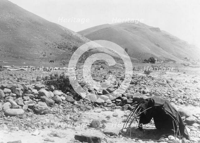 Nez Percé sweat-lodge, c1910. Creator: Edward Sheriff Curtis.