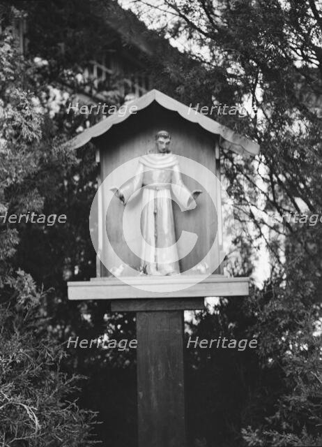 St. Francis statue in garden of Mrs. J.C. Brady, 1931 July 14. Creator: Arnold Genthe.