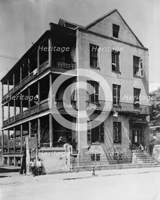 Front and side view of apartment(?) house, 61 Washington Street, Charleston, South..., c1933 - 1940. Creator: Frances Benjamin Johnston.