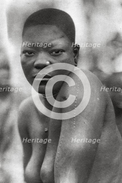 Awemba girl, Livingstone to Broken Hill, Northern Rhodesia, 1925 (1927). Artist: Thomas A Glover