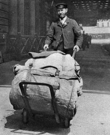 A train porter, London, 1926-1927. Artist: Unknown