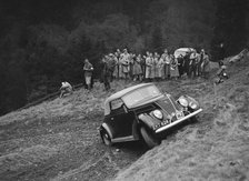 Ford V8 of J Cleland competing in the MCC Edinburgh Trial, Roxburghshire, Scotland, 1938. Artist: Bill Brunell.