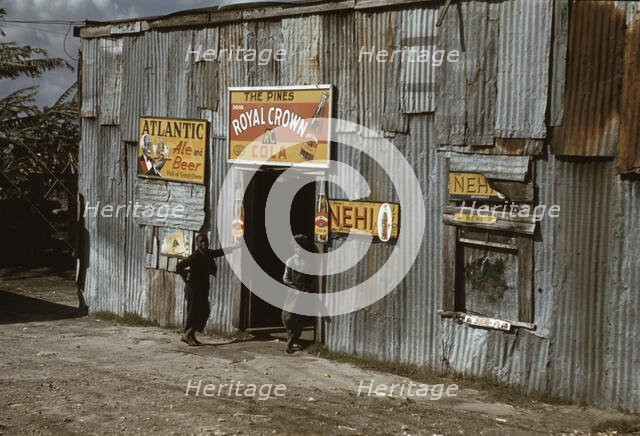 Negro migratory workers by a "juke joint" (?), Belle Glade, Fla., 1941. Creator: Marion Post Wolcott.