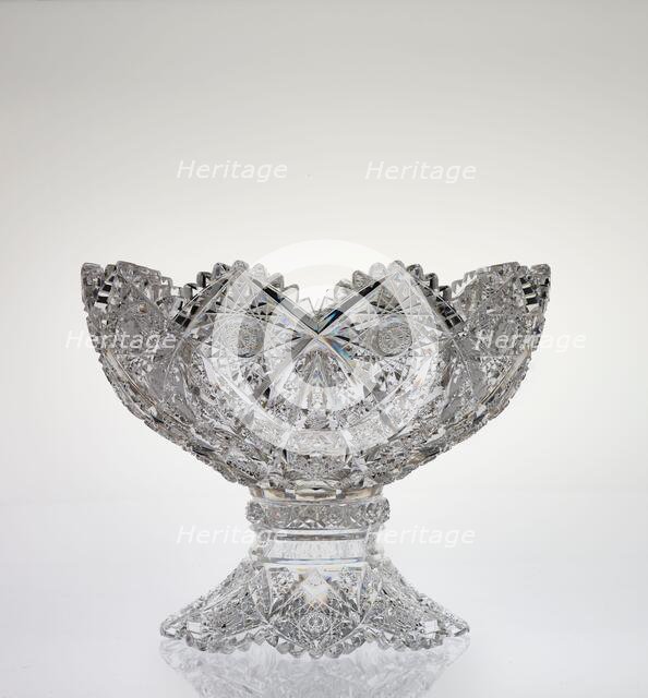 Kensington pattern punch bowl on stand, probably designed about 1895-1900. Creator: TG Hawkes & Co.