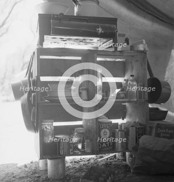 Tent interior in a labor contractor's camp, showing household equipment, near Westley, CA, 1939. Creator: Dorothea Lange.