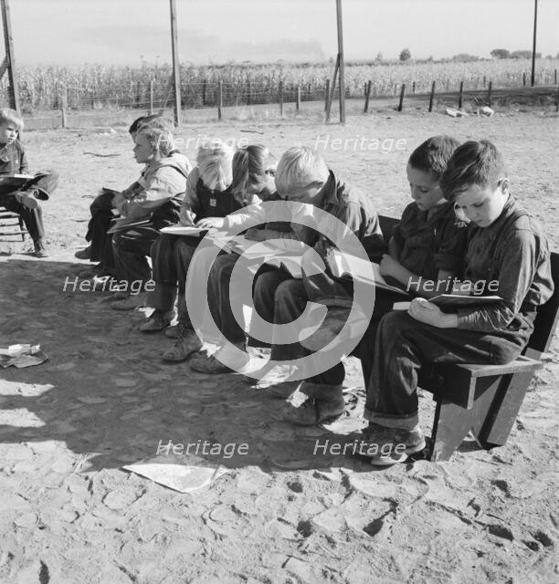 Eight boys at Lincoln Bench School, near Ontario, Malheur County, Oregon, 1939. Creator: Dorothea Lange.