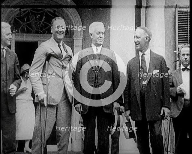 Franklin D. Roosevelt Stands on Crutches Besides Democrat Al Smith and Another Man, 1924. Creator: British Pathe Ltd.