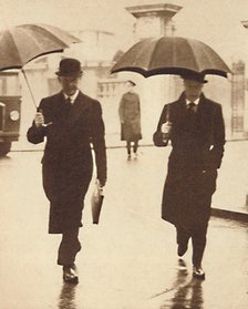 'Walking In The Rain', 1937. Artist: Unknown.