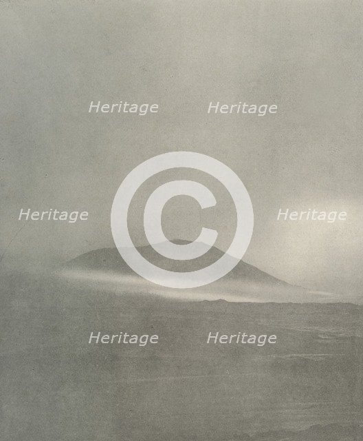 'The Start of a Blizzard...Drift Coming Round Mount Erebus', c1908, (1909). Artist: Unknown.