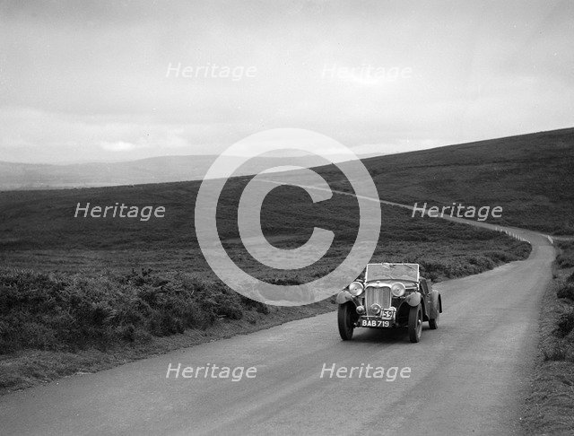 John Donald Barnes' Autosports team Singer B37 at the MCC Torquay Rally, July 1937. Artist: Bill Brunell.