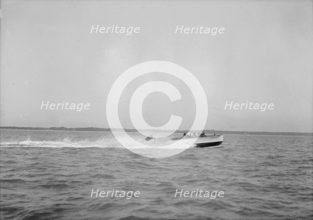 Unknown speedboat underway. Creator: Kirk & Sons of Cowes.